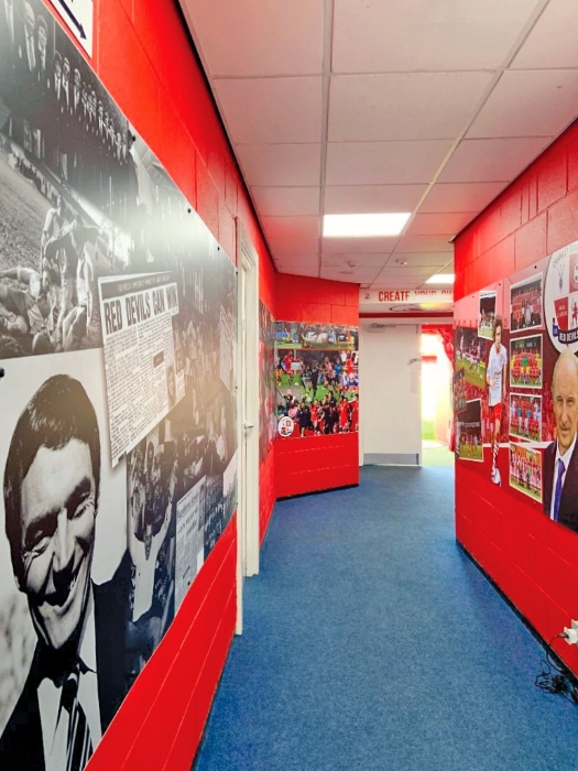 Larger than life graphics and wall murals help transform the fan experience